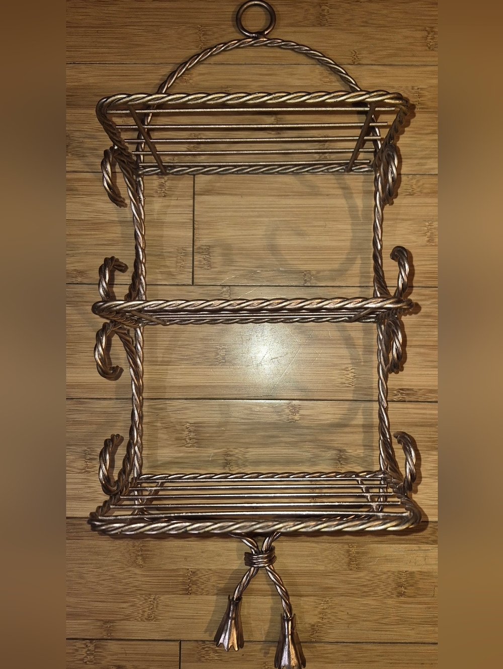 Vintage Homco Hollywood Regency wall shelf featuring a three-tiered Shelf